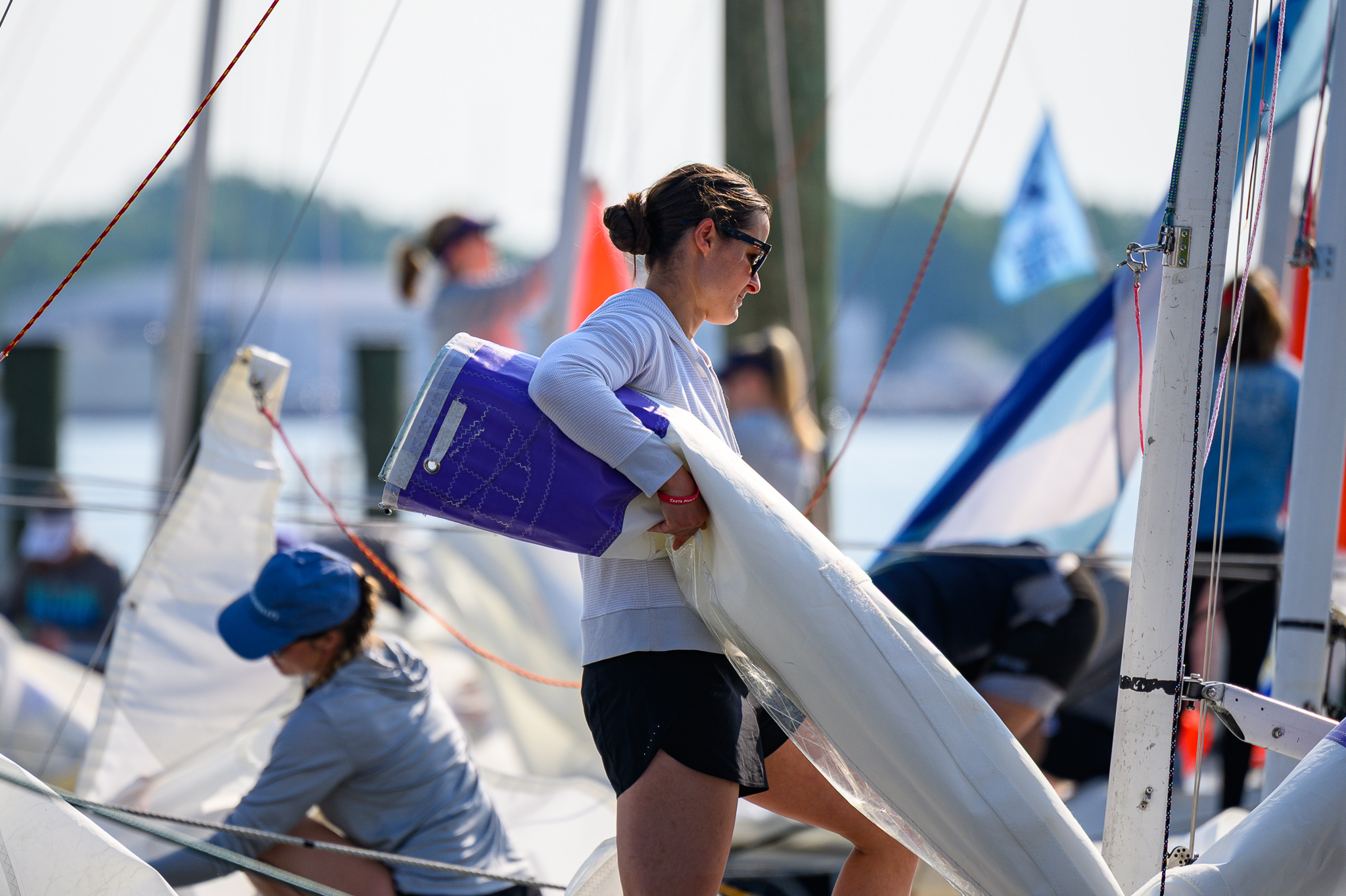 Crew working together during race
